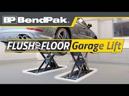 slick bendpak car lift in home garage