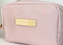 pink vegan leather embossed makeup bag