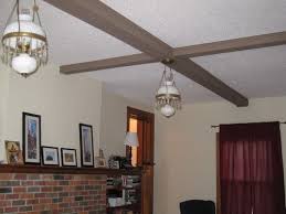 paint these beams to go with wood trim