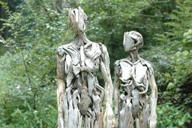 the eerie humanoid driftwood sculptures