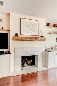 Wooden Mantel And Stone Fireplace
