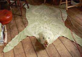 kitchy faux bear skin rugs are perfect