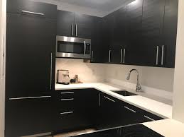 Here's the going rates for contractors that install ikea kitchens: Ikea Tingsryd Custom Corner Cabinets Custom Fridge Panels Top Cabinet Contemporary Kitchen New York By Basic Builders Inc Houzz