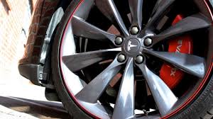 Next, tape over the undamaged parts of the wheels, as well as the air valve stem, and spray a layer of chrome spray paint designed for chrome wheels. Wheel Bands Review Tesla Model S Curb Rash Protection