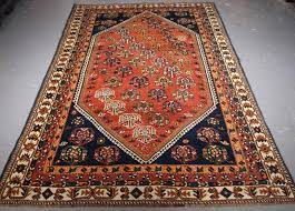 old tribal style rug shiraz region