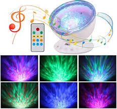 Ohuhu Remote Control Ocean Wave Night Light Projector Projection Lamp Rotation Northern Light Projector Mood Light Upgraded 12 Led 7 Colors With Built In Speaker For Baby Nursery Adults And Kids Amazon Com
