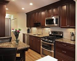 Overall, there's a lot of visual interest in this kitchen. How To Pair Countertop Colors With Dark Cabinets