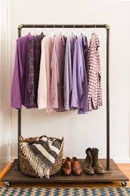 Clothes hanging rails can be installed anywhere. Diy Clothing Rack How To Make A Mobile Clothing Rack Hgtv