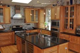 Uba tuba granite fabricated with a half bullnose edge installed on light wood cabinets with a 50/50 image result for honey oak cabinets ubatuba granite. Black Granite Countertops Styles Tips Video Infographic