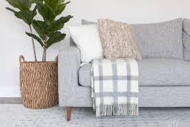 to display throw blankets on your couch