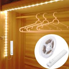 Amazon Com Motion Sensor Wardrobe Light 1m Led Strip Closet Lights Pir Auto On Off Battery Powered Warm White For Bedside Bathroom Closet Cabinet Kitchen Stairs Home Improvement