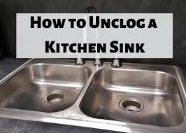clear a clogged kitchen sink drain