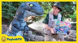 giant life size raptor blue dinosaur