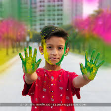 indian boy playing with colors