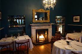 33 Cosy Restaurants With Fireplaces In