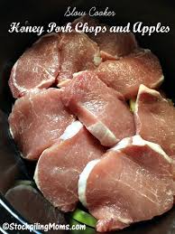 The pork chops are cooked in a slightly sweet tangy sauce along with sweet onions and butter. Slow Cooker Honey Pork Chops And Apples Recipe Honey Pork Chops Honey Pork Recipes