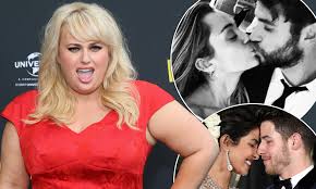 Rebel wilson has hit the red carpet in monaco with her new man, jacob busch, who is rumoured to be worth more than $140 million. Will We Hear Wedding Bells Rebel Wilson Jokes That She S Next In Line To Be Married Daily Mail Online
