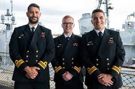three royal australian navy officers