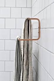 «an organized #bathroom made easy! Make It Awesome Simple Ikea Towel Rack Hack Curbly Ikea Towel Rail Ikea Storage Bathroom Hacks