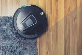 robot vacuum cleaner cleaning on dusty