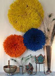 Orange Juju Hat Feather Wall Hanging