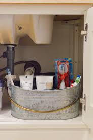 how to organize under the bathroom sink