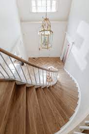 grand staircase and herringbone floors