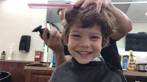 watch a 3 year old enjoy a haircut