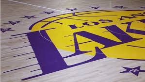 This logo also features the star, between the l.a. Lakers Staples Center Floor Celebrates 16 Championships