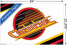 A similar version of this logo is used as their shoulder patches and for their third jerseys. Amazon Com Trends International Nhl Vancouver Canucks Retro Logo 19 Wall Poster 22 375 X 34 Premium Unframed Version Home Kitchen
