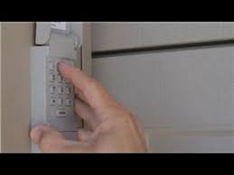 reset a garage door keypad outside