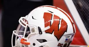 wisconsin football snags in state