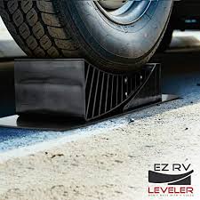 After leveling a trailer, use any stabilizers you might have if they can be opened at no more than a 45 degree angles. Ez Rv Leveler Curved Leveling Ramps With Chocks And Rubber Mats Don T Mess With A