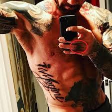 Wwe superstar dave batista tattoos. Dave Bautista S 33 Tattoos Their Meanings Body Art Guru
