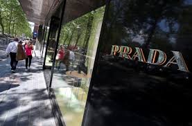 Prada expects to join Richemont-Farfetch talks over online tie-up | Reuters