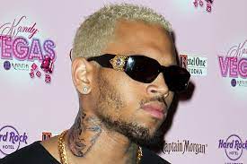 It is a sugar skull, which is associated with the mexican celebration of the day of the dead, combined with a mac cosmetics design that brown had seen. Chris Brown Denies His Beaten Up Woman Tattoo Is A Depiction Of Rihanna