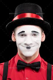 portrait of smiling mime with makeup