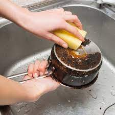 here s how to clean a burnt pot or pan