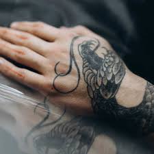 You can get a japanese snake tattoo that covers your middle finger and wrist. The Significance And Symbolism Of Snake Tattoos Self Tattoo