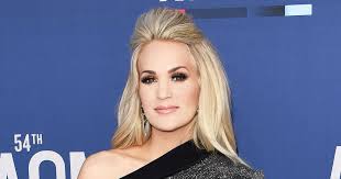 She has white skin, but look at some of her music videos, if you really want to know. Country Music S Blonde Bombshells