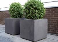 A well known way to garden in small spaces is in order to use pots and containers. Concrete Planters Passion For Pots