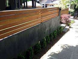 Wood Fence On Top Of Concrete Retaining