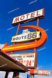 low angle view of route 66 motel signs