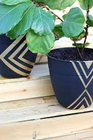 I am absolutely in love with this project from the east coast creative girls! Snazzy Painted Planter Pots Plant Pot Diy Plant Pot Design Plastic Flower Pots