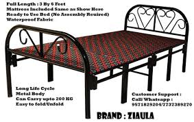 metal black foldable bed with attached