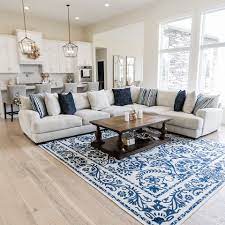 how to place blue rugs in every room in