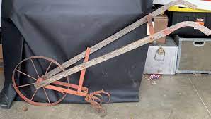 antique hand plow push plow cultivator