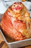 Should I cover a spiral ham when cooking?