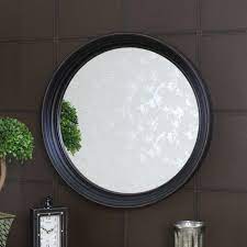 large round black wall mounted mirror