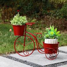 red metal bicycle plant stand